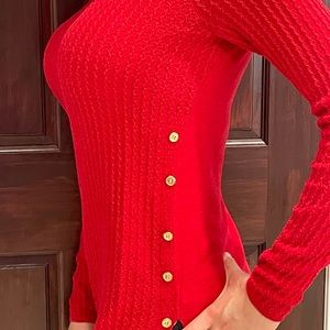Limited red sweater with gold buttons